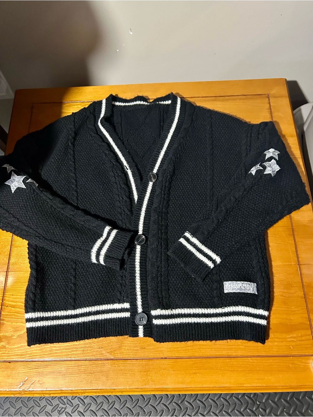 Taylor Swift Black Cardigan with White Trim and Star Sleeves